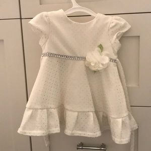 Adorable white dress with silver polka dots.